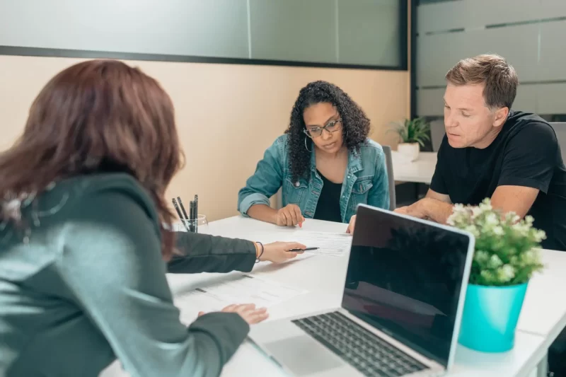 Couple consulting a financial counselor