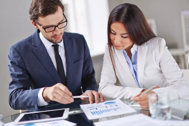 Female worker advising on investment